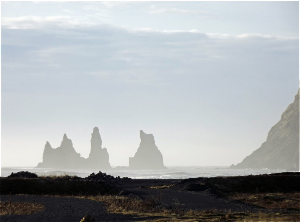 Misty view of offshore rock stacks